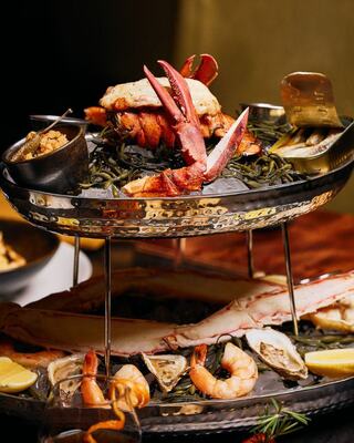 Seafood tower including shrimp, lobster and more